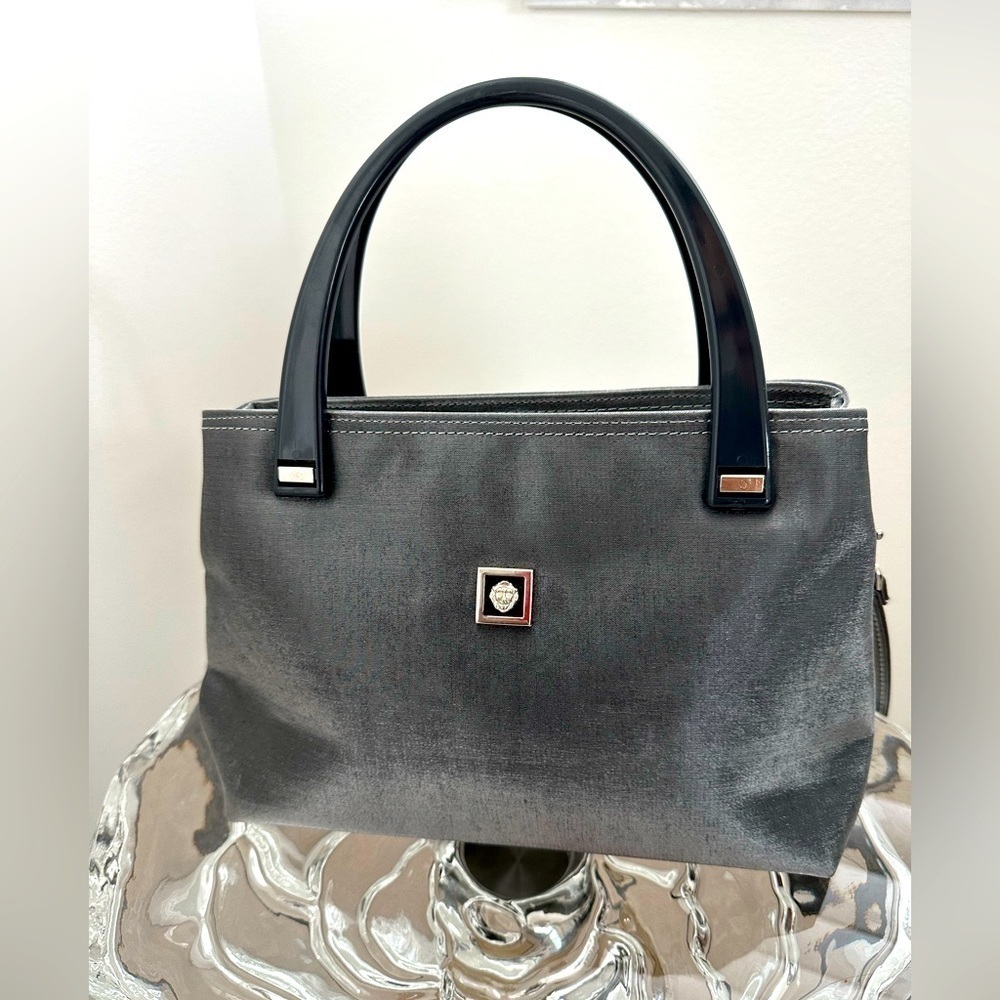 Handbag - Gray iridescent Shiny Fabric with plastic handles and silver accents.